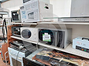 Shelf with second-hand appliances inside a store