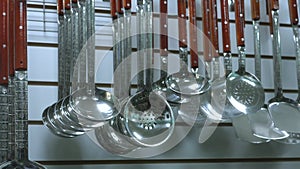 shelf in the store with cutlery