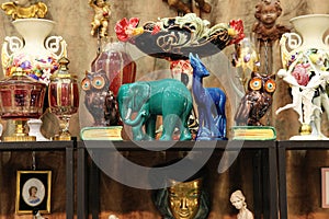 Shelf with vintage Souvenirs, figurine of an elephant