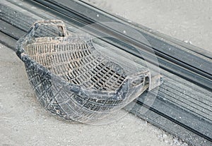 Shell shaped basket is used for brick, stone, soil, sand for construction. Construction concept