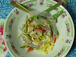 Shell Soup with Garlic, Chilli , Mint and Basil. Traditional Northeast of Thailand food - Esan Food name Pad Hoy with Horapa