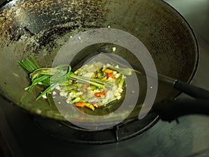 Shell Soup with Garlic, Chilli , Mint and Basil. Traditional Northeast of Thailand food - Esan Food name Pad Hoy with Horapa