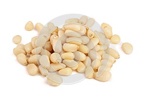 Shelled cedar pine nuts isolated on white background