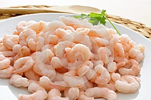 Shelled raw shrimps photo
