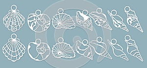 Shells of the sea in the form of pendants. Laser cutting. Craft paper for decoration. Plotter, screen printing photo