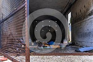 A shelter and garbage bins set on fire