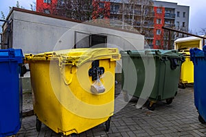 A shelter and garbage bins set on fire