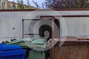 A shelter and garbage bins set on fire