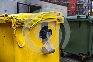A shelter and garbage bins set on fire