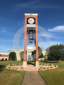 Shelton State Community College yard with a stone watch sculpture in Old Greensboro, Tuscaloosa, USA photo