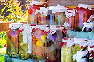 Shelves with canned fruit and vegetable