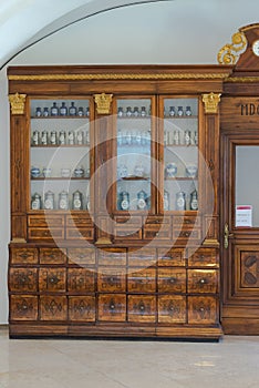 Shelves with cans in an old pharmacy