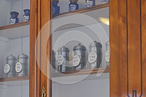 Shelves with cans in an old pharmacy