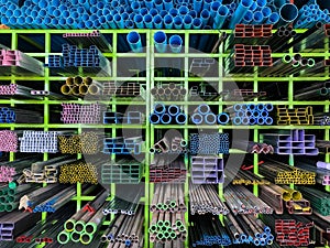 Shelves of different metal products and PVC tubes, pipe pvc  and  different metal products on the Shelves for construction