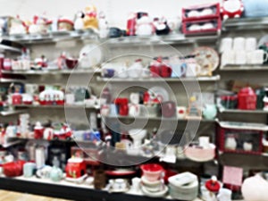 Shelves in the holiday aisle at retail store full with Christmas merchandise. Abstract blur