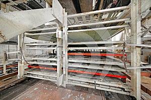 Shelves for lead bars in broken old ionization calorimeter in an abandoned underground laboratory for the study of cosmic rays photo