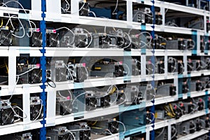 shelves with power supply units for cryptocurrency