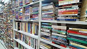 Shelves of Used Books Displayed for Sale