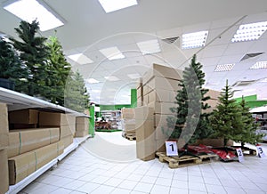 Shelves with variety of artificial Christmas tree