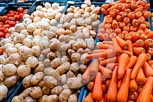 Shelves with vegetables in a grocery store