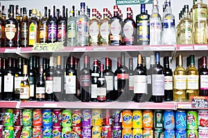 Shelves with vodka, beer and soft drinks