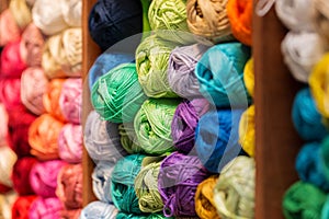 Shelves with wool and yarn in a knitting shop