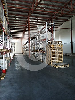 Shelving System With Boxes in Distribution Warehouse, Large industrial warehouse with high racks