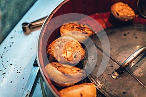 Sheng Jian Bao: Fried white pork bun topping with sesame. Street food of Jiantan in Taipei, Taiwan