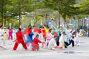 Retired people are practicing martial art dance in street