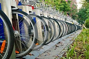 Shenzhen, China: rows of shared bicycles parked on the sidewalk