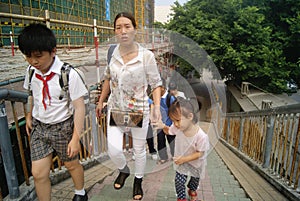 Shenzhen, China: students on the way home from school