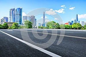 Shenzhen city skyline and clean asphalt road background