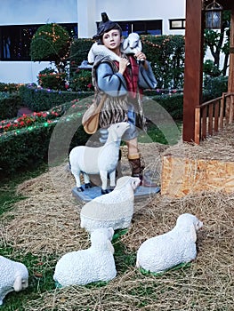 The shepherd boy and sheep sculpture.