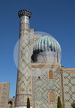 Sher-Dor Madrasah in Registan square photo