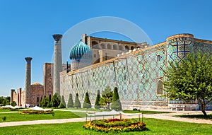 Sher Dor madrasah on Registan Square in Samarkand, Uzbekistan photo