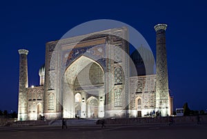 Sher-Dor Madrasah on Square Registan, the inscription above the gate in a special Arabic script it says `Lord Almighty!` . Samarka