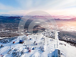 Sheregesh Kemerovo region ski resort in winter, landscape on mountain and hotels, aerial top view