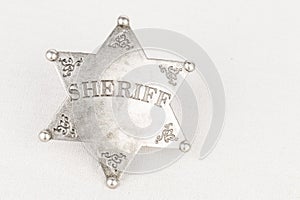 Sheriff badge.