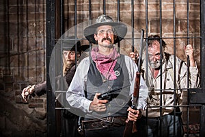 Sheriff Poses With Prisoner photo