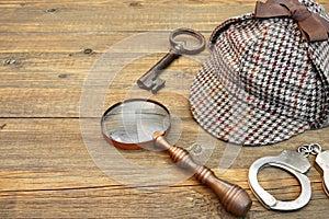 Sherlock Holmes Cap famous as Deerstalker, Key, Handcuffs and Ma