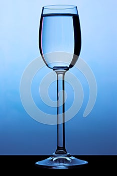 Sherry glass under a blue ligh