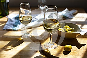 Sherry wine tasting, dry fino, manzanilla or palomino jerez fortified wine in glasses, Jerez de la Frontera, Andalusia, Spain