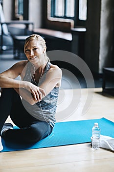 Shes amped for this workout. an attractive young woman listening to music while working out in the gym.