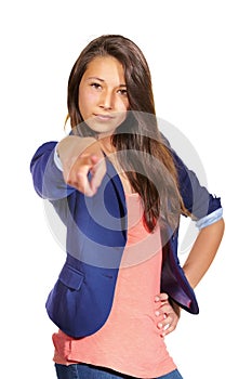 Shes beautiful and confident. Studio shot of a beautiful teenage girl pointing to the camera isolated on white.