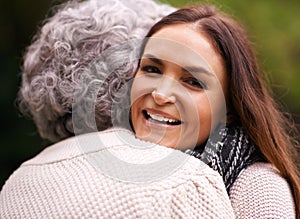 Shes always been there for me. Portrait of a woman embracing her senior mother outdoors.