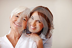 Shes devoted to her mom. Portrait of a woman spending time with her elderly mother.