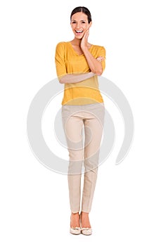 Shes everybodys woman. Studio shot of a casually dressed young woman isolated on white.