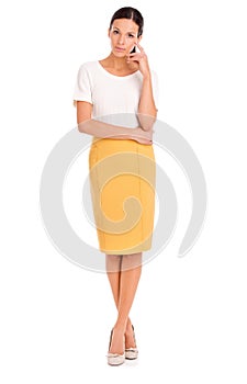 Shes everybodys woman. Studio shot of a casually dressed young woman isolated on white.