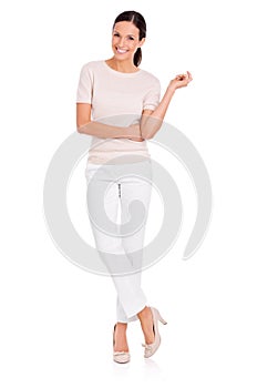 Shes everybodys woman. Studio shot of a casually dressed young woman isolated on white.