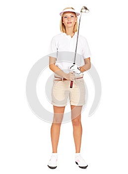 Shes got game. Studio portrait of an attractive young golfer isolated on white.